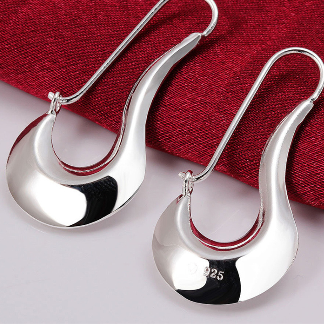 Modernist style earrings in polished 925 sterling silver