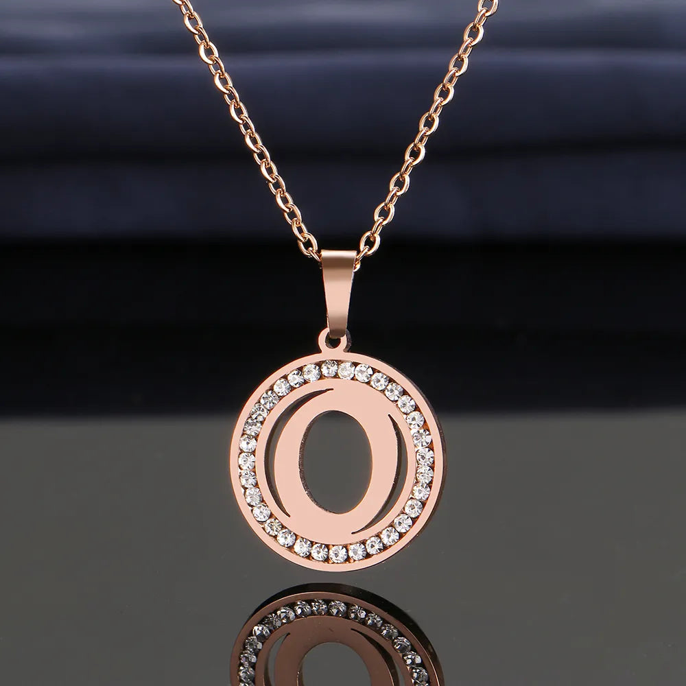 Initialhalsband i 18K guld/rosépläterat och 925 silver med kristall och rhinestone