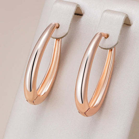 Trendy shiny hoop earrings in 18K Rose Gold Plating