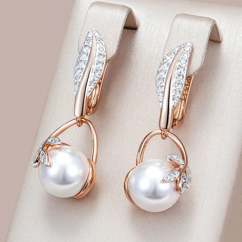 Earrings with pearl pendant and white cubic zirconia leaves in 18K pink gold - AC