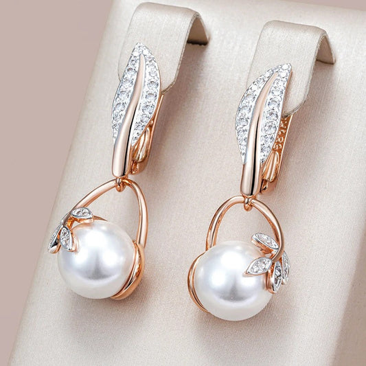 Earrings with pearl pendant and white cubic zirconia leaves in 18K pink gold - AC