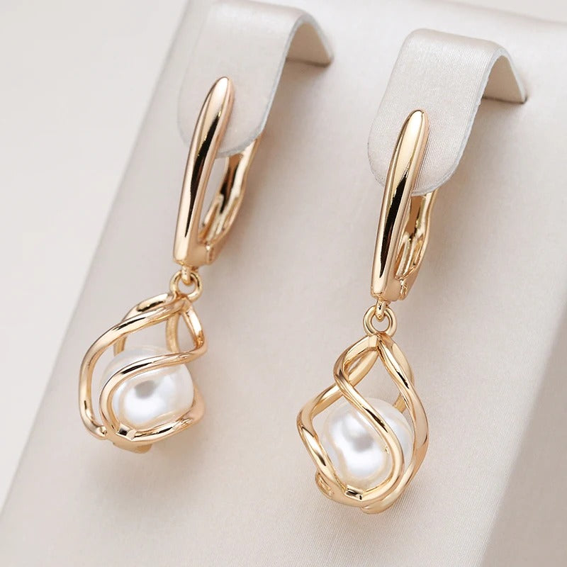 Button earrings in pearls plated 18kt rose gold with cubic zirconia - AC