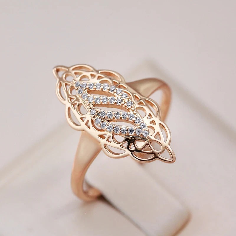 18kt rose gold plated wide ring with ethnic flower and white zircons - AC