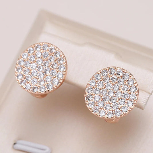 Round Stud earrings filled with white zircons