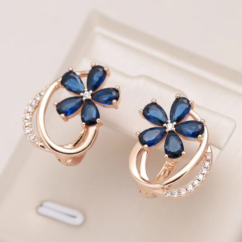 Button earrings plated in 18kt rose gold with sapphire and white cubic zirconia - AC