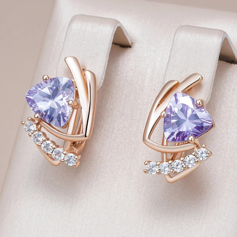 Stud earrings with shiny purple natural zirconia and small white zirconia in 18K rose gold plating