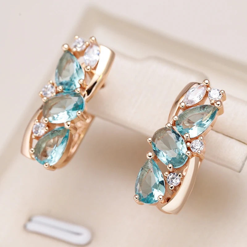 Long stud earrings with aquamarine zirconia and white zircons in 18K Rose Gold Plated