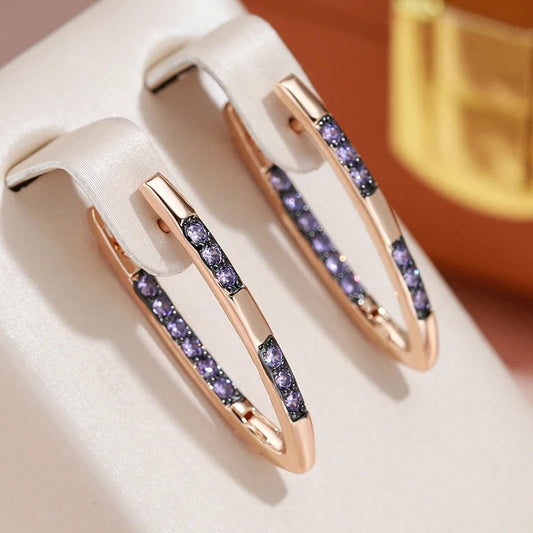 18K Rose Gold Plated V-shaped geometric design earrings with purple zirconias