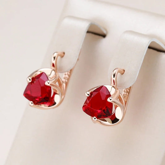 Stud earrings with ruby zirconia in 18K rose gold plating