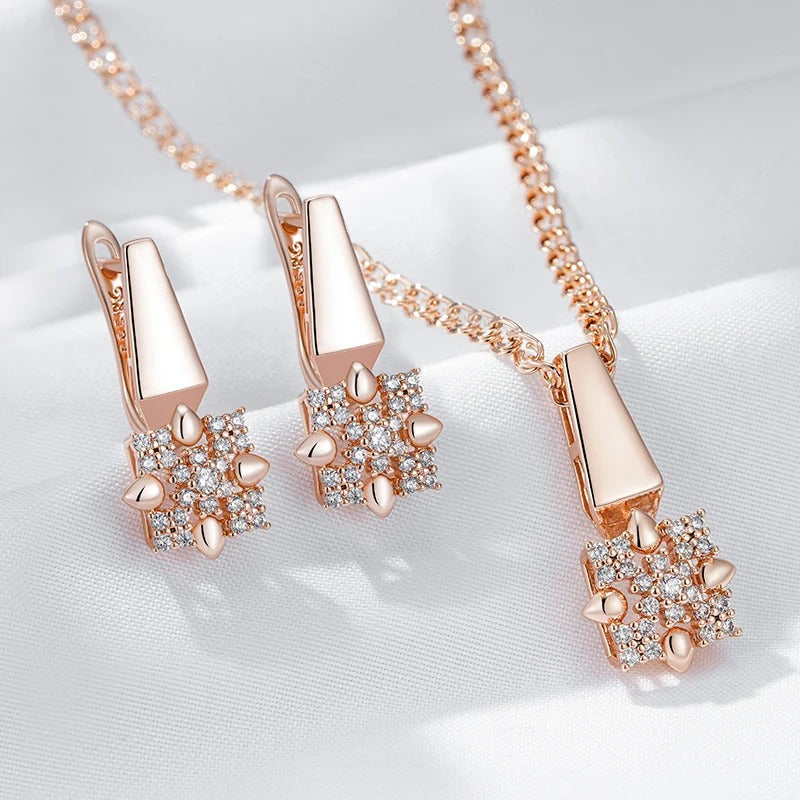 Set of pendant and earrings in square shapes with white zirconia in 18K rose gold plating