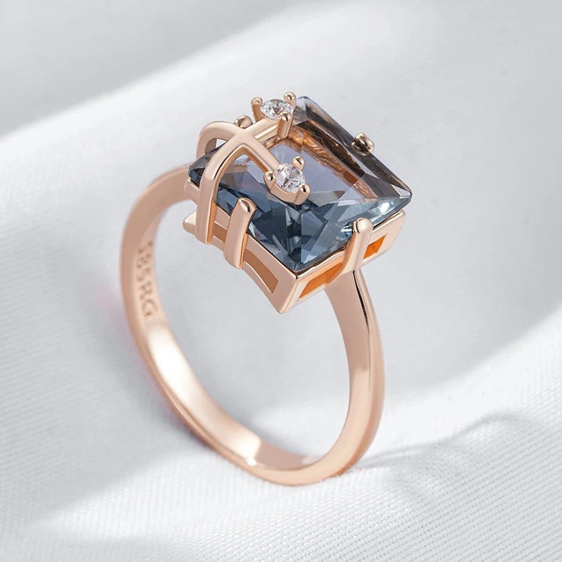 Classic ring with large rectangular shiny grey stone and cubic zirconia, plated in 18K pink gold - AC