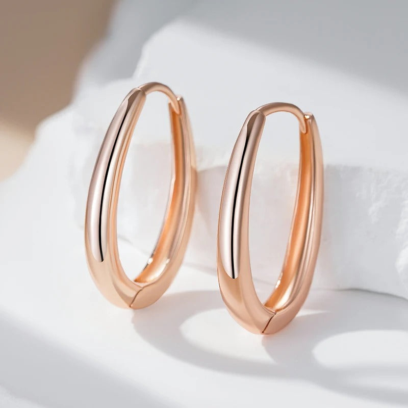 Trendy shiny hoop earrings in 18K Rose Gold Plating