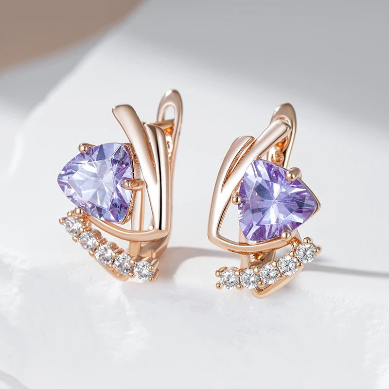 Stud earrings with shiny purple natural zirconia and small white zirconia in 18K rose gold plating