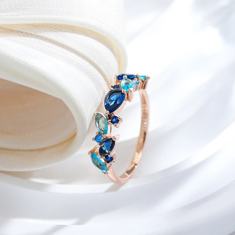 Sea stones ring with aquamarine zirconia and sapphire in 18K gold plating