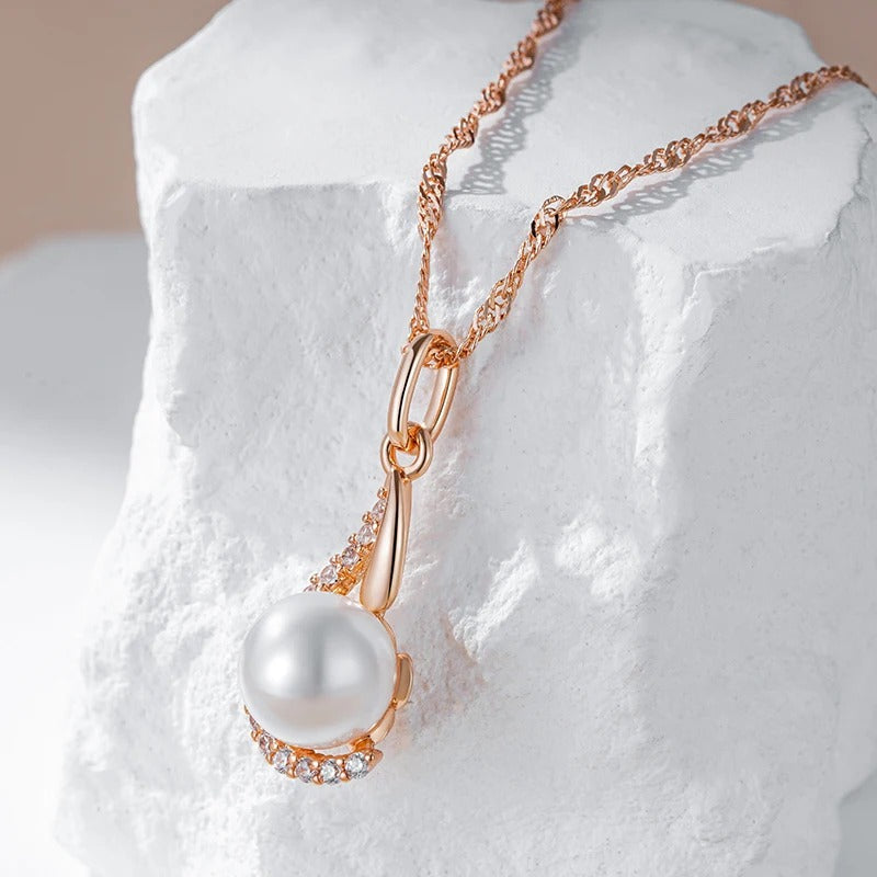 Drop-shaped earrings with single pearl and zircons in 18K Rose Gold Plating