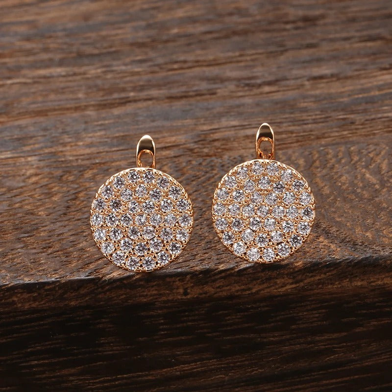 Round Stud earrings filled with white zircons