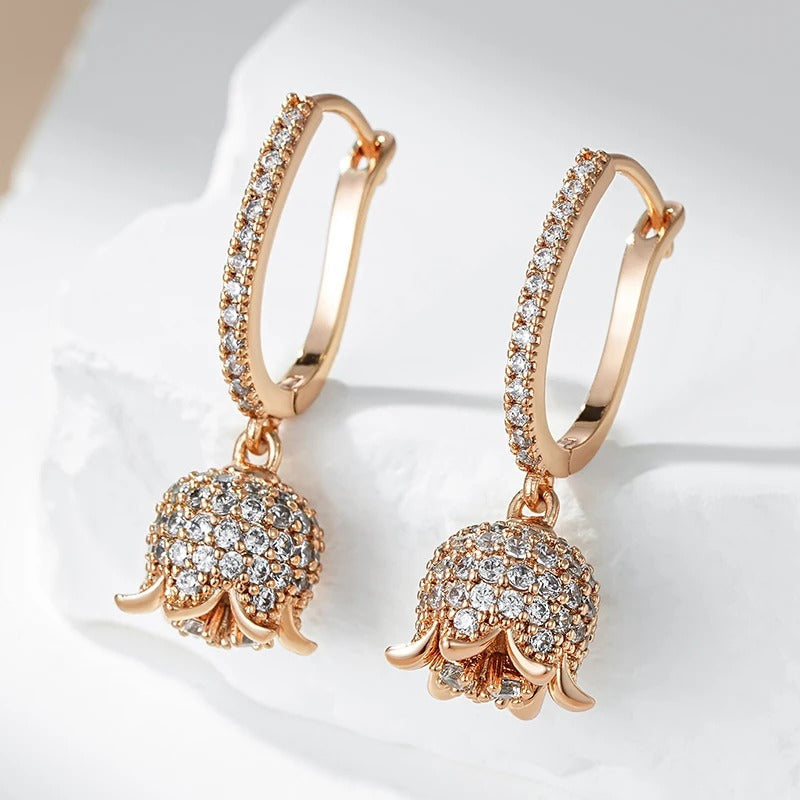 18K Rose Gold Plated Long earring made of shiny natural zirconia in the shape of a flower