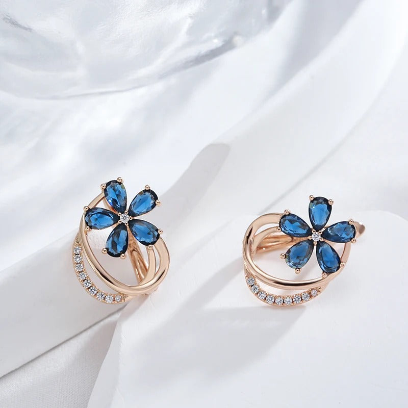 Button earrings plated in 18kt rose gold with sapphire and white cubic zirconia - AC