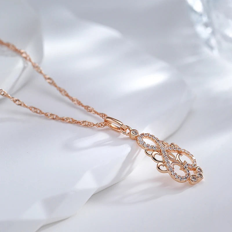 Ethnic style zirconia infinity necklace in 18K rose gold plating