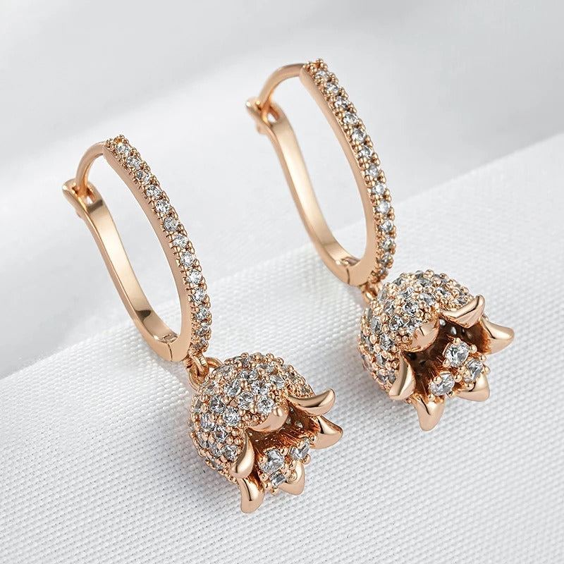 18K Rose Gold Plated Long earring made of shiny natural zirconia in the shape of a flower