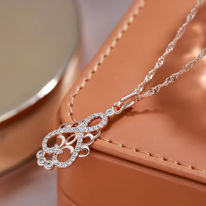 Ethnic style zirconia infinity necklace in 18K rose gold plating