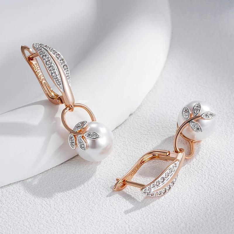 Earrings with pearl pendant and white cubic zirconia leaves in 18K pink gold - AC