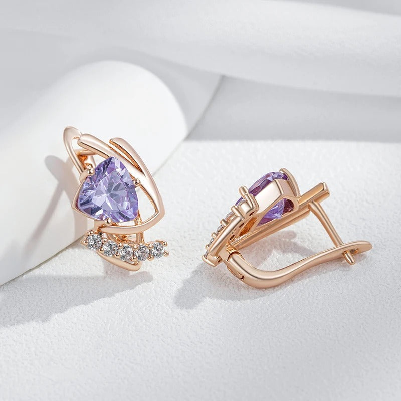 Stud earrings with shiny purple natural zirconia and small white zirconia in 18K rose gold plating