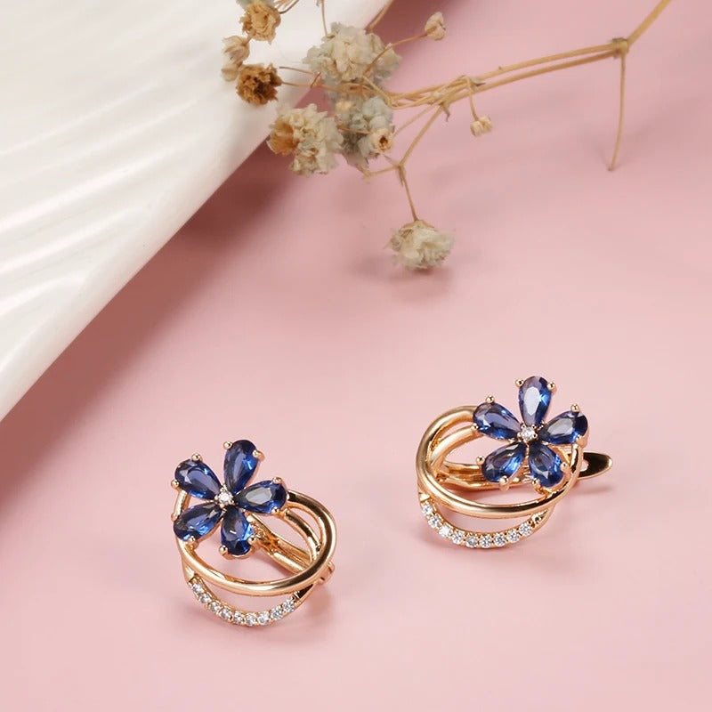 Button earrings plated in 18kt rose gold with sapphire and white cubic zirconia - AC