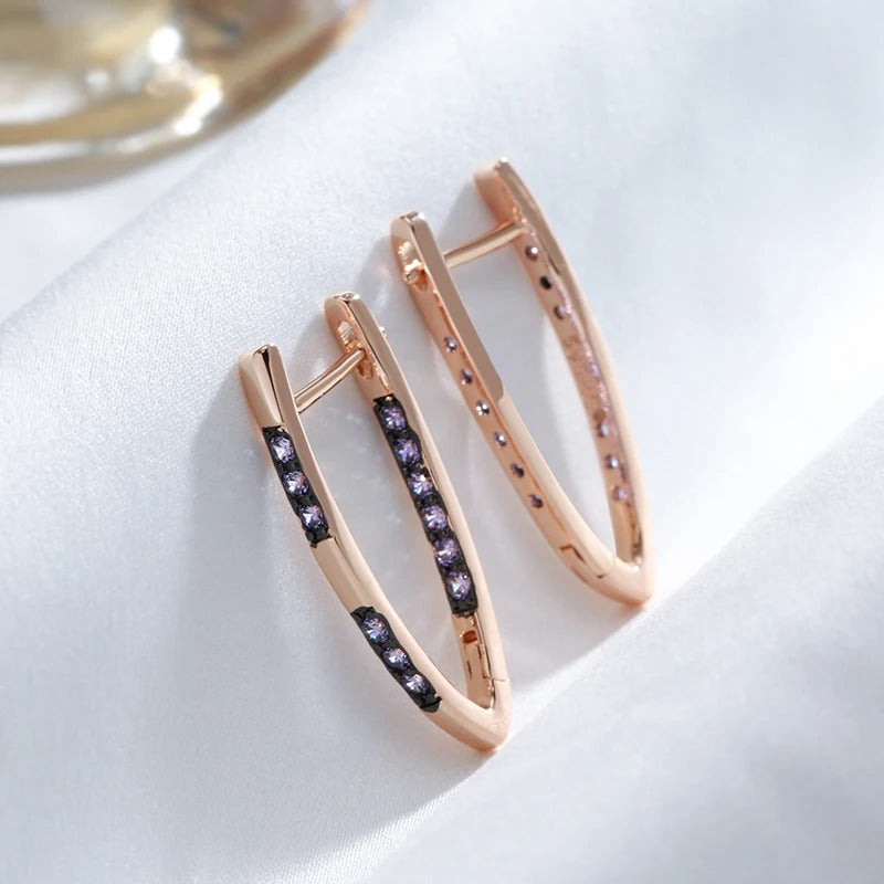 18K Rose Gold Plated V-shaped geometric design earrings with purple zirconias