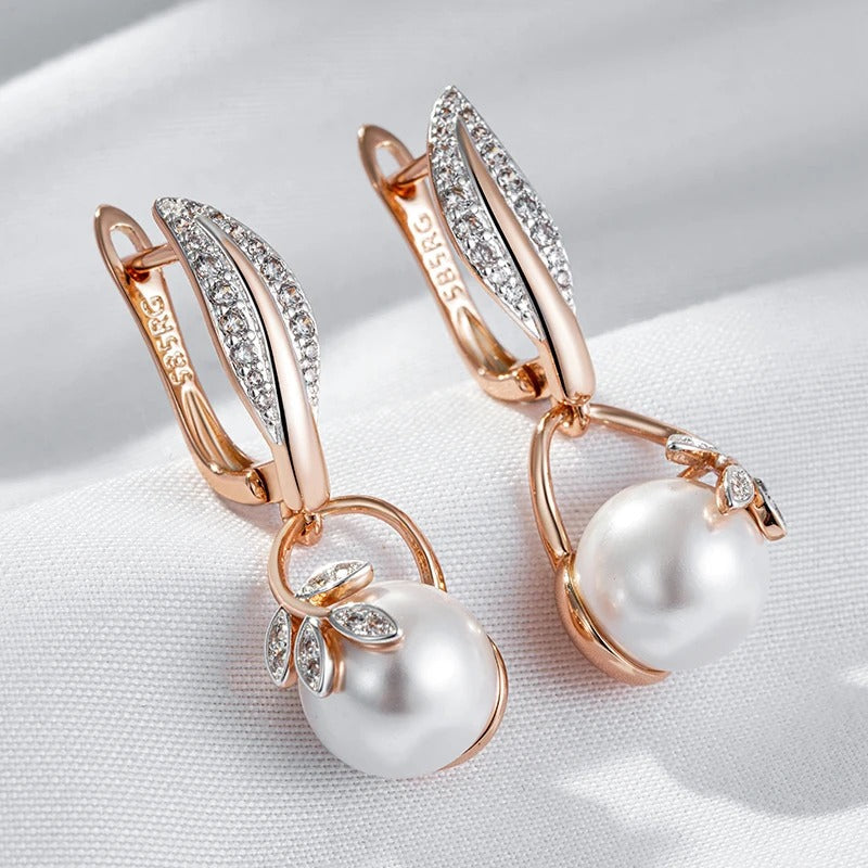 Earrings with pearl pendant and white cubic zirconia leaves in 18K pink gold - AC