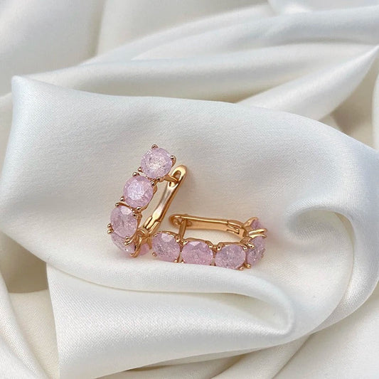 Hoop earrings filled with rose quartz zirconias in 18K Rose Gold Plating