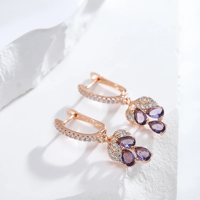 Luxurious 18K rose gold plated dangling earrings with purple cubic zirconia stones - AC