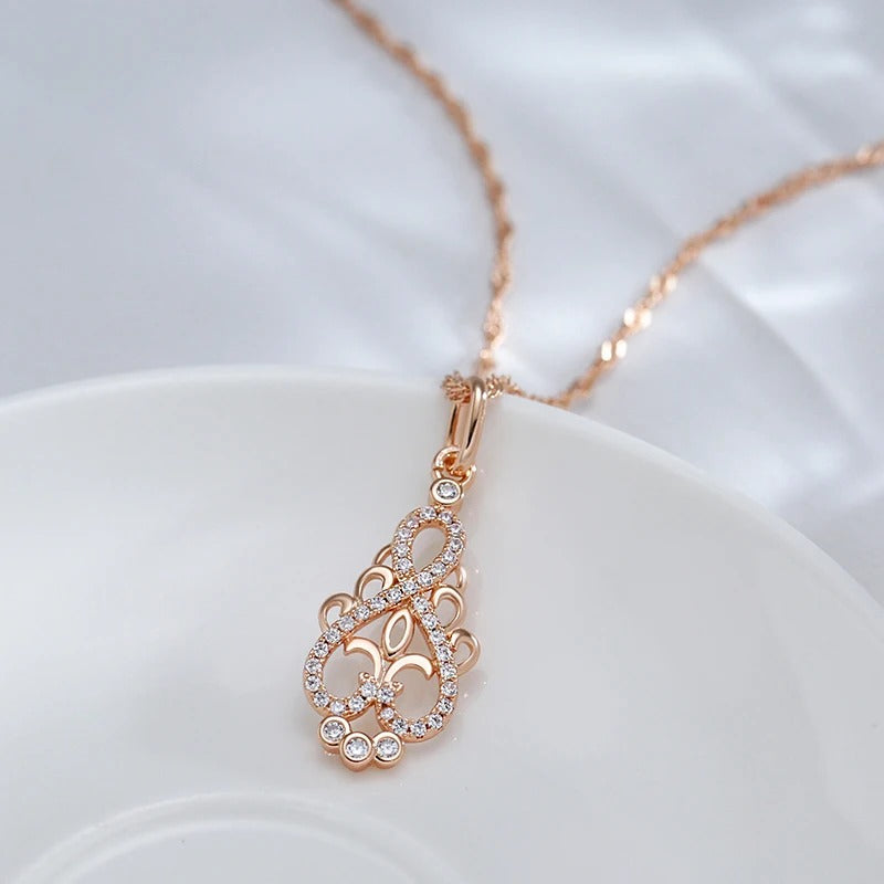 Ethnic style zirconia infinity necklace in 18K rose gold plating