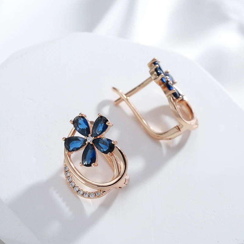 Button earrings plated in 18kt rose gold with sapphire and white cubic zirconia - AC