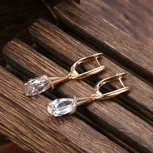 Long drop-shaped hoop earrings with silver and white zircon with 18K rose gold plating