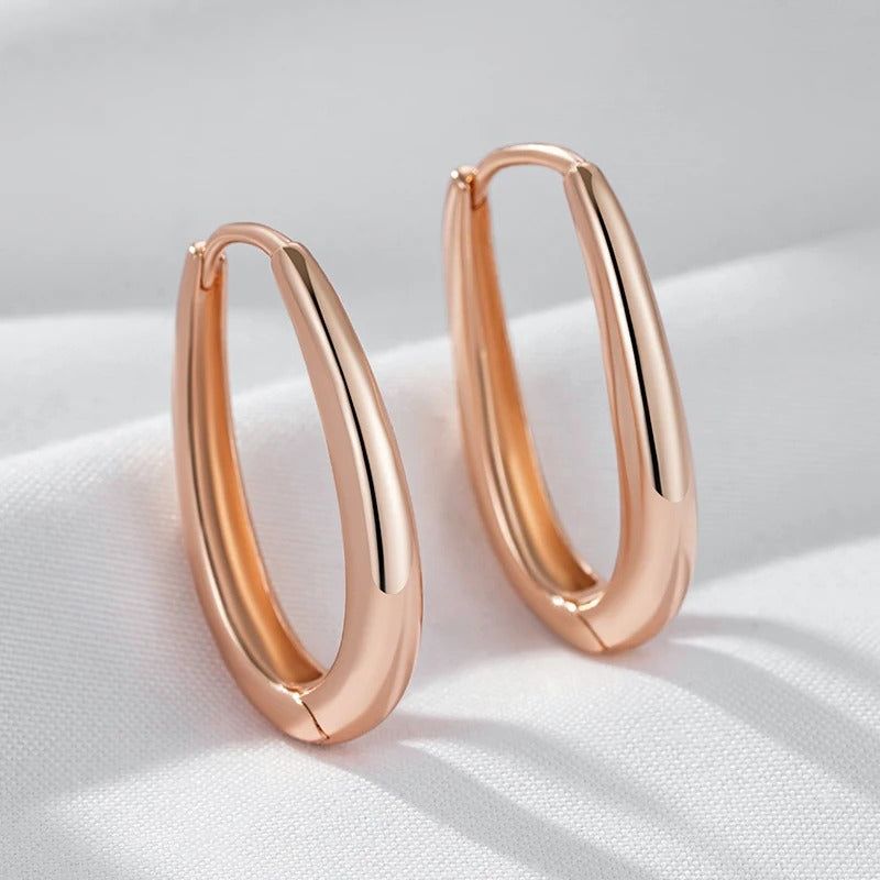 Trendy shiny hoop earrings in 18K Rose Gold Plating