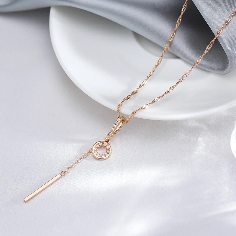 Necklace with long star pendant and fine rectangle with zirconia in 18K rose gold plating