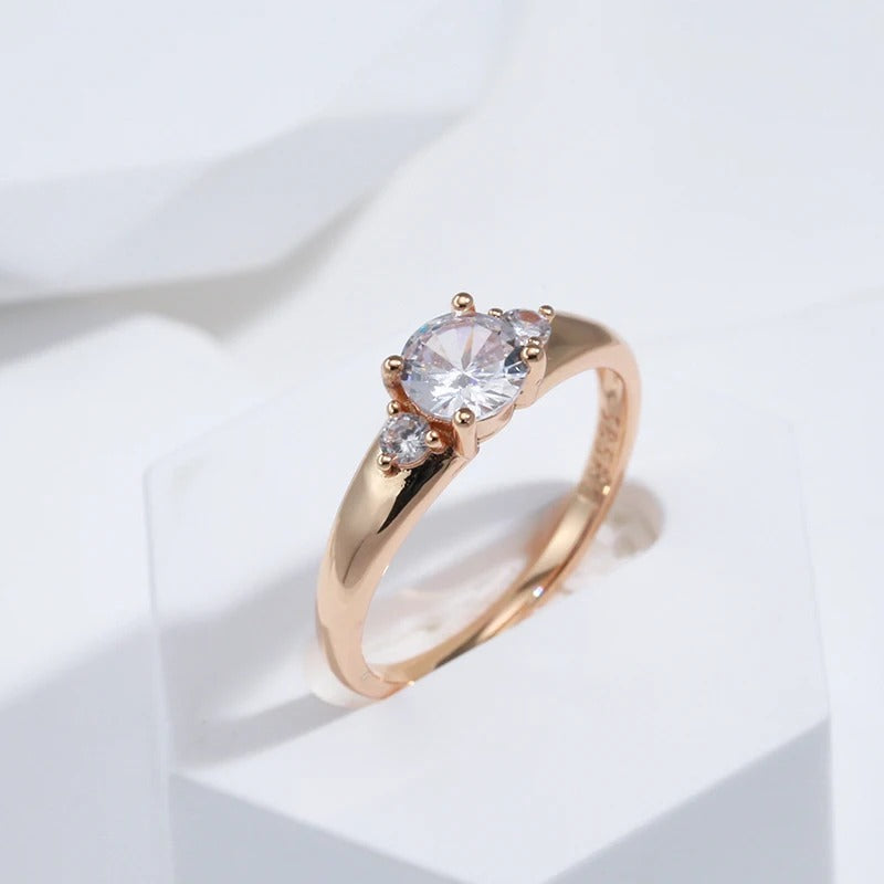 Classic ring plated in 18kt pink gold with 3 white cubic zirconia - AC