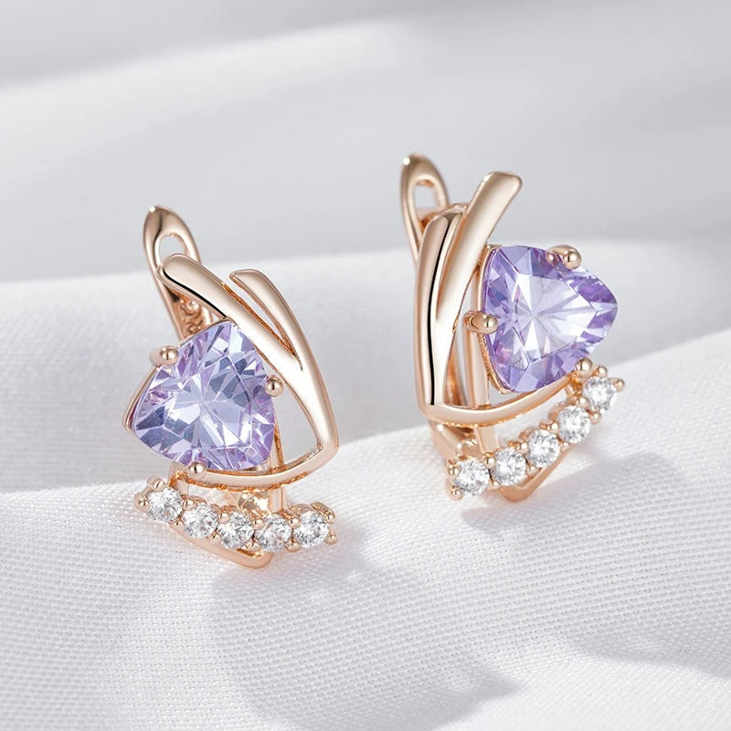 Stud earrings with shiny purple natural zirconia and small white zirconia in 18K rose gold plating