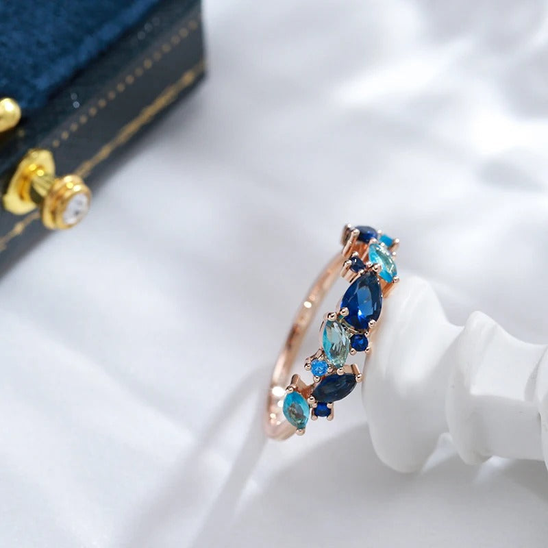 Sea stones ring with aquamarine zirconia and sapphire in 18K gold plating