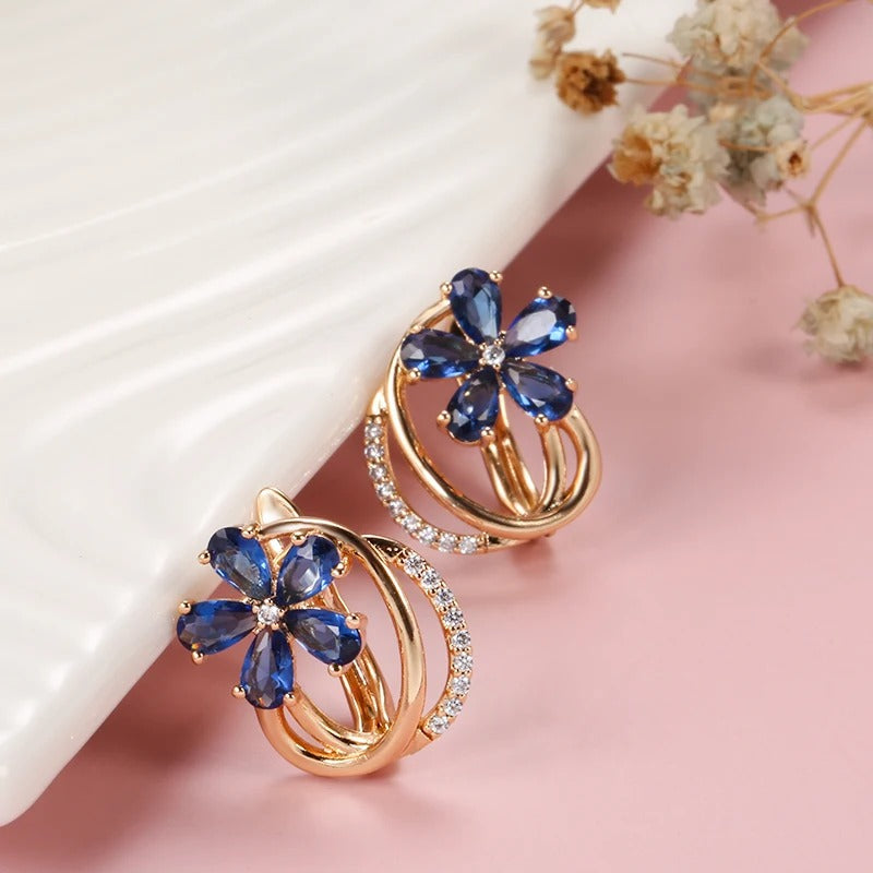 Button earrings plated in 18kt rose gold with sapphire and white cubic zirconia - AC