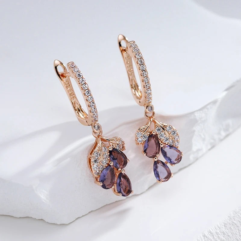 Luxurious 18K rose gold plated dangling earrings with purple cubic zirconia stones - AC